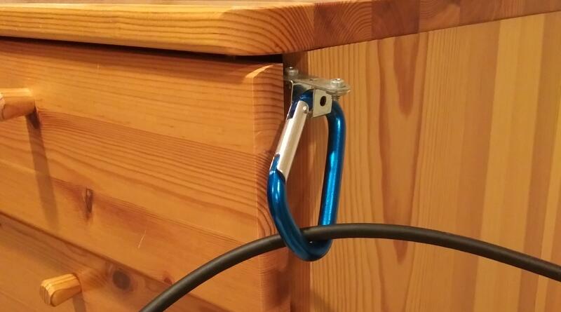 Using a carabiner to hold the cable